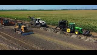 Nohl Tiling. Pattern tile project on wheat ground #nohltiling #draintile #bron550 #excavator 