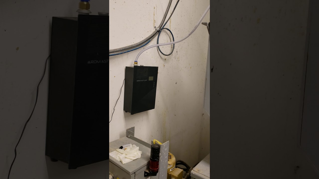 Installing an Aroma Styler into a Compactor Room Trash Duct.