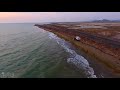 تصوير جوي لشاطئ القحمة وتظهر جزيرة كدمبل بجمالها الفاتن وقت الغروب . تم التصوير يوم الجمعة ٩-٤-١٤٤١