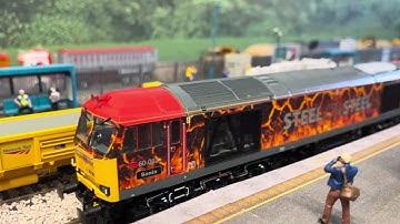 Cavalex Class 60 DB Schenker 60062 with a steel train