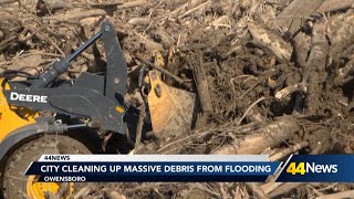 City cleaning up massive debris from riverfront flooding