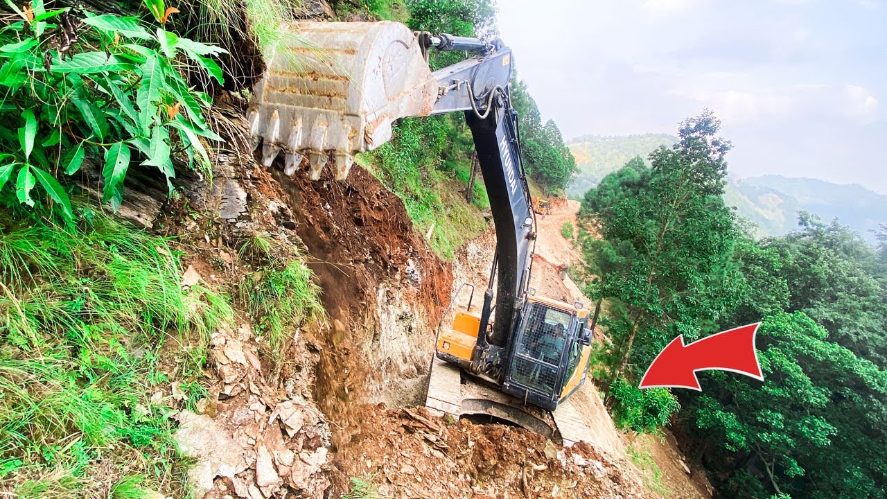 Watch This Excavator Carve a New Road Through a Dangerous Mountain Pass | Excavator Planet