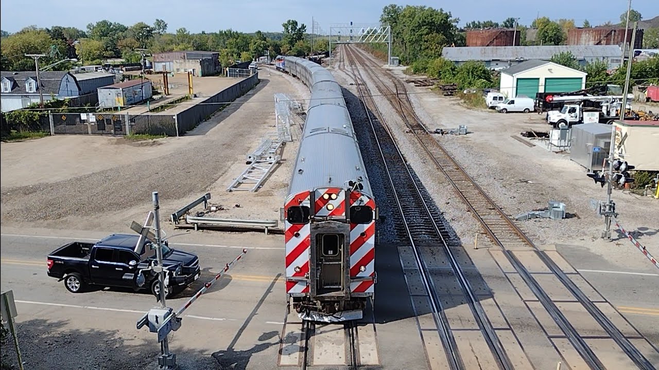 Metra Rondout Metra cab-car 8511 east with MP36 401 at Rondout, Illinois on September ...