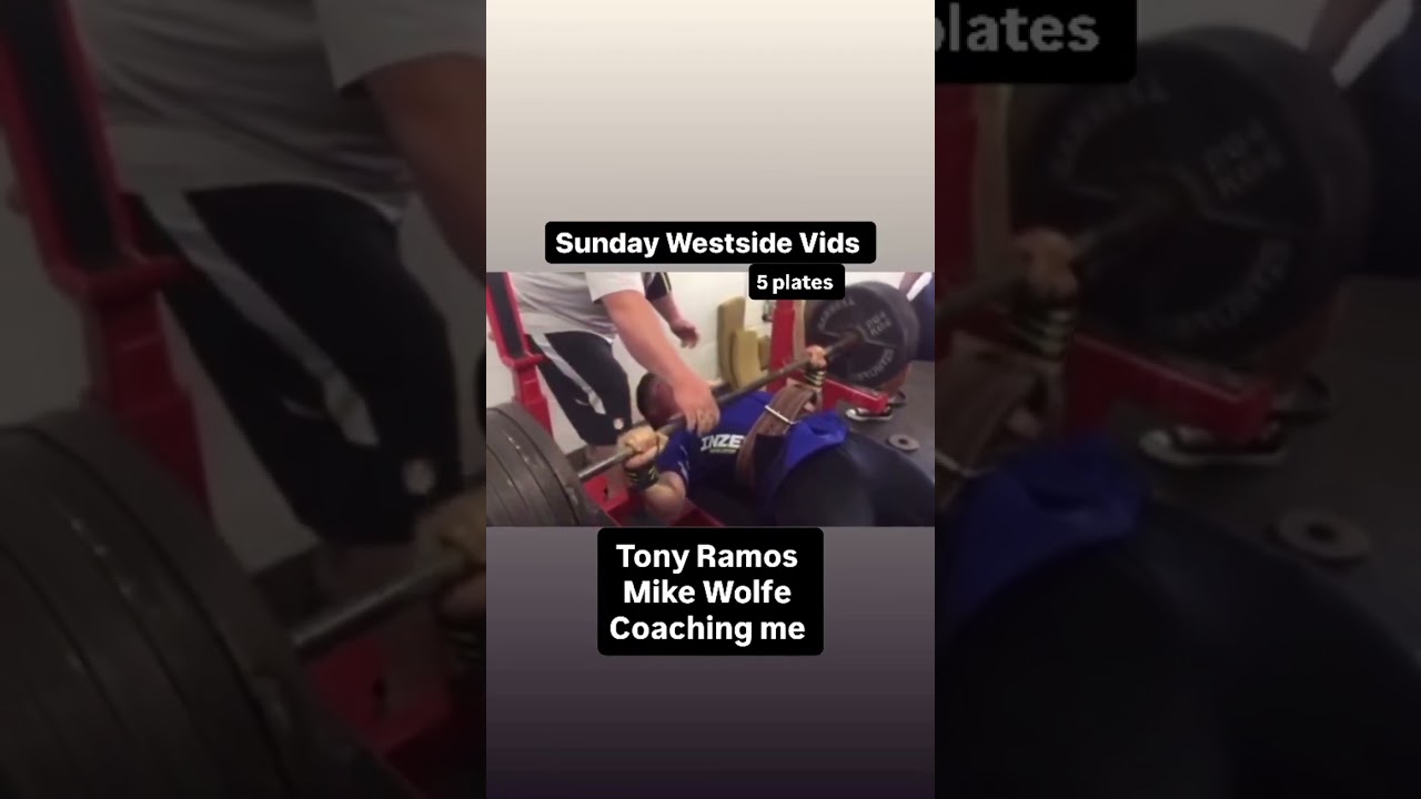 coaching me on 5 plates bench attempt