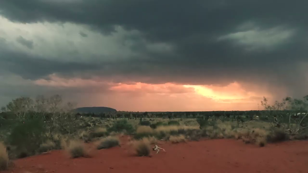 Epic Stormy Sunset Over Uluru | Mesmerizing Outback Timelapse