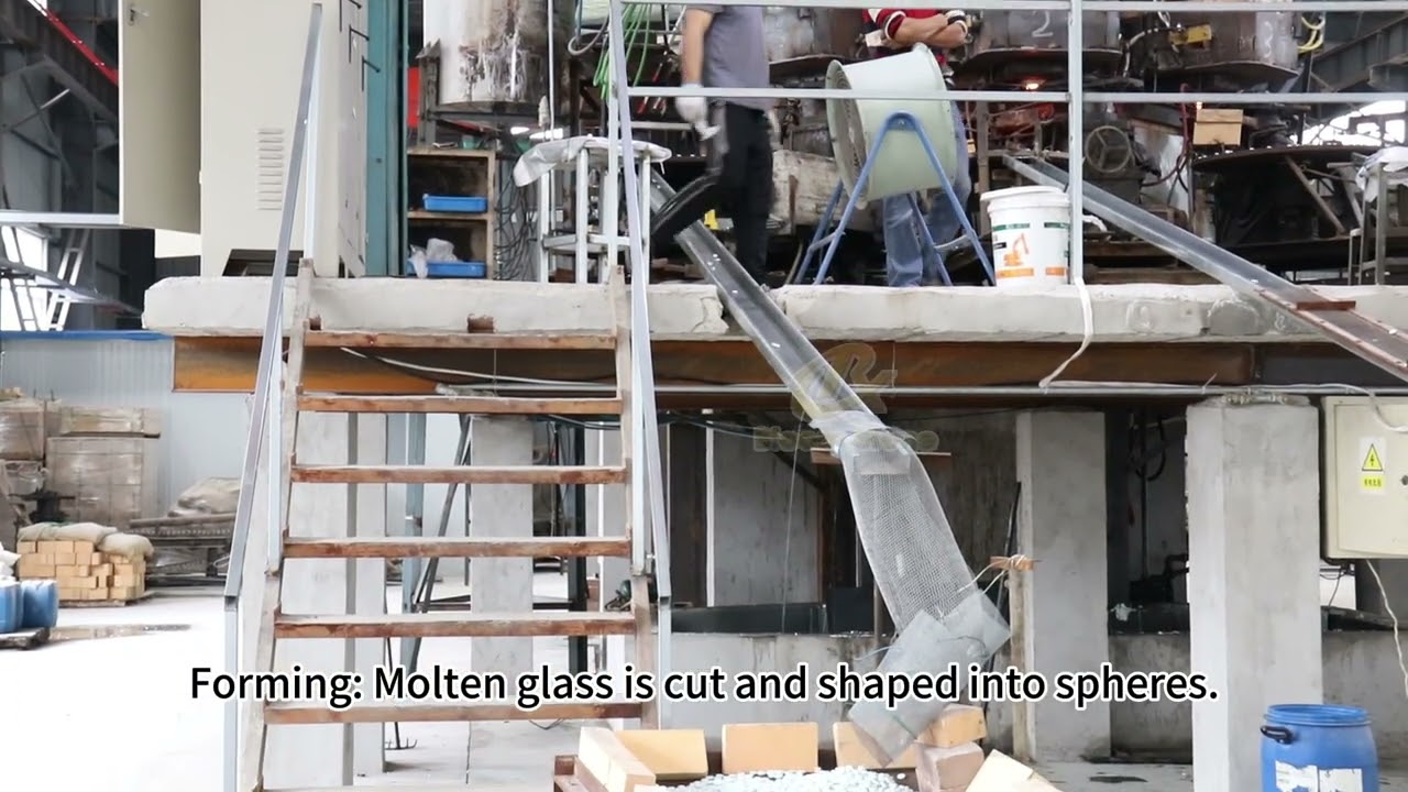 Production process of glass marbles