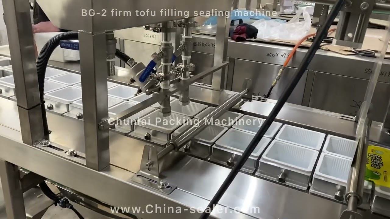 Firm tofu packing liquid filling box sealing machine