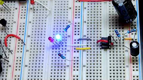 Astable mode 555 timer built on breadboard to constantly flash LEDs electronics circuit