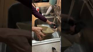 Pampered Chef Lisa cleaning the Stone Loaf Pan