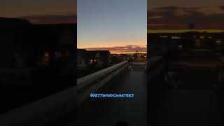 Moon rising and Sun setting