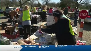 Harvesters hands out free food during distribution event at KNI in Topeka