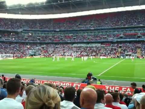 At Wembley Stadium for the first friendly after the World Cup fiasco for England football team in 2010. As you will hear, a few of the England players who played in that tournament get a less than warm reception, apart from the obvious Chelsea fan sitting in front of us!