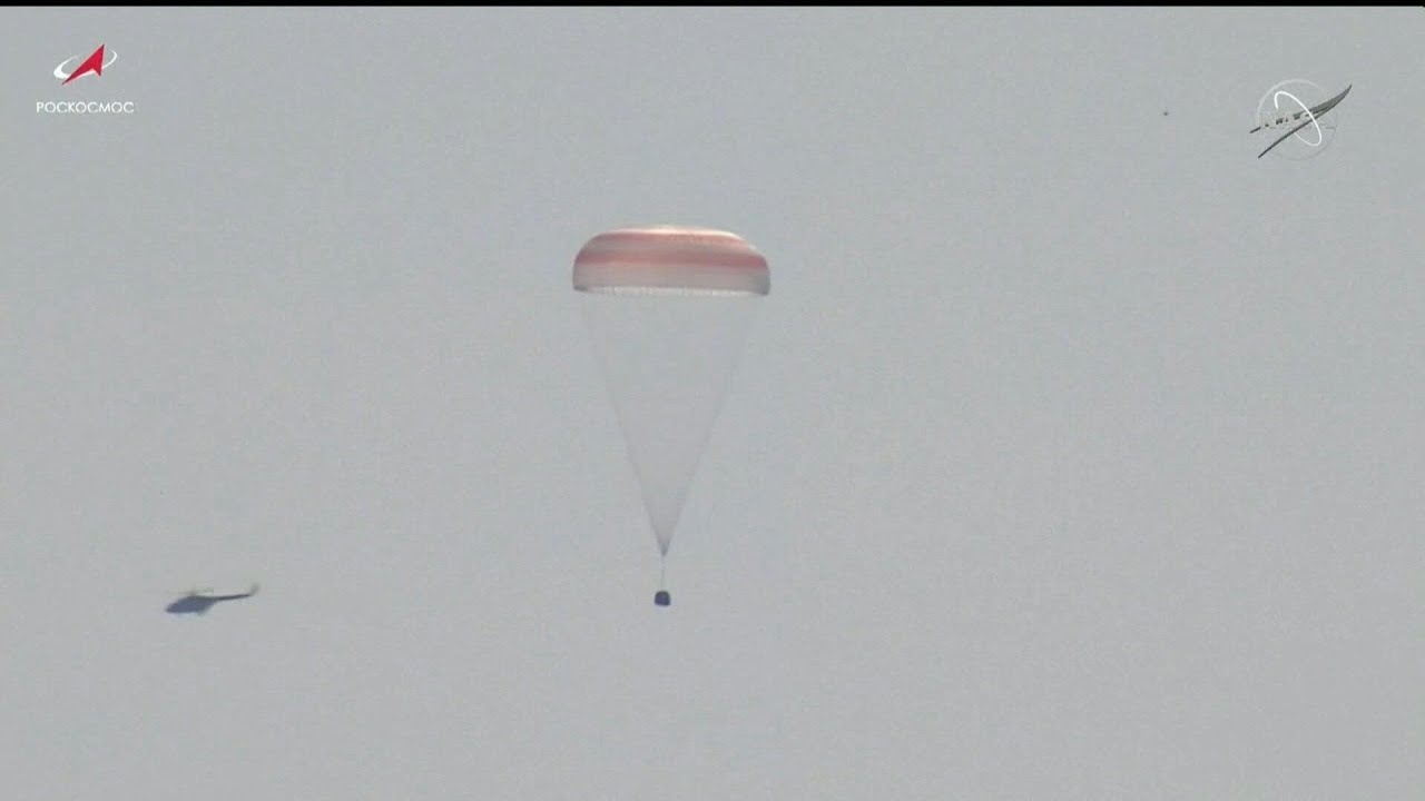 Two Russian cosmonauts, NASA astronaut return from ISS | AFP - YouTube