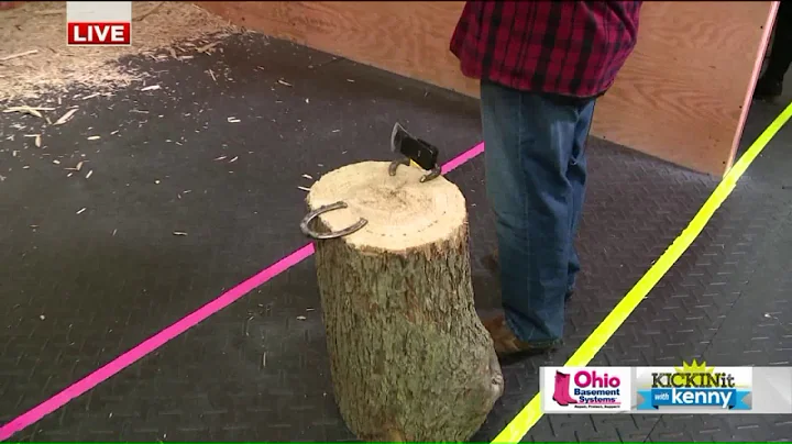 Ax throwing with the pro's -- Kenny's aiming for a...
