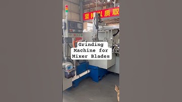 CNC four-axis single-sided knife grinding machine with automatic loading and unloading.