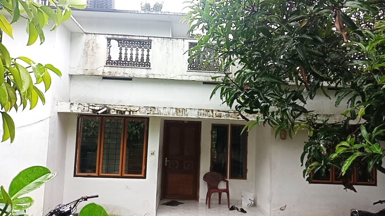 44 cents land with house and cow shed at karukutty, kochi