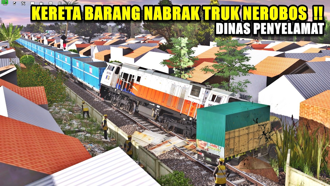 KERETA BARANG NABRAK TRUK NEROBOS - DINAS PENYELAMAT