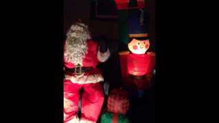 Outdoor inflatable Christmas decorations at house on orchar Cambridge, MA. Merry Christmas. December 2014.