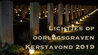 Lichtjes op oorlogsgraven kerstavond 2019