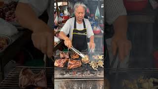 Asian Street BBQ Chaos – Grilled Lizard and Giant Frog in a Crowded Market@streetflavor-ai