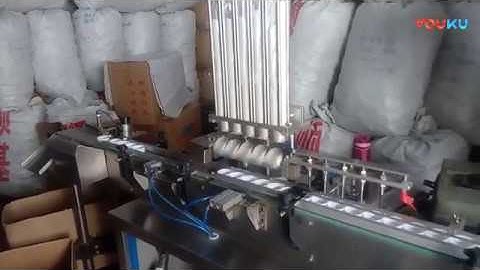 Automatic linear 5 head cap lining machine for wads aluminum foil