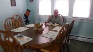 Grandpa eating his steak for Father's Day and kids in basement 06/16/2013