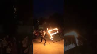 Outdoor fire show. Fire cube