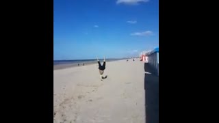 Guy Lands On His Face After Failing To Backflip At The Beach