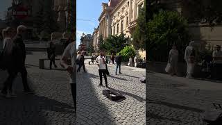 Bucharest Romania Violin street performer in Lipscani (Old Town)