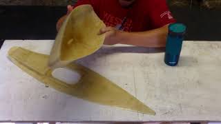 Fiberglass model sailboat. Laying the fiberglass