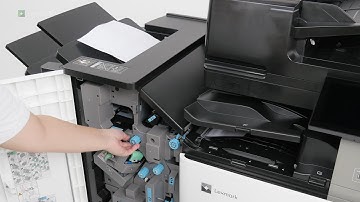 CS963/CX833/CX961/CX962/CX963—Paper jam in the booklet finisher and paper transport