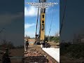 Driving Concrete Pipe Piles Into Ground For Foundation Construction