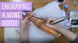 Engraving a Bottle of Rosé Wine by Hand with Floral Details