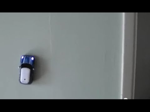 toy cars that drive on walls