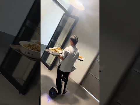 Innovative Food Delivery: Balance Scooter Efficiency in Restaurant Corridors