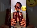 P diddy aka Sean Combs with The Hennessy VS bottles