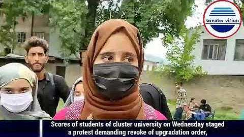 Scores of students of cluster university  staged a protest demanding revoke of upgradation order,