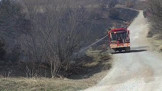 RAW VIDEO: Crews contain Logan County grass fire amid high fire danger day