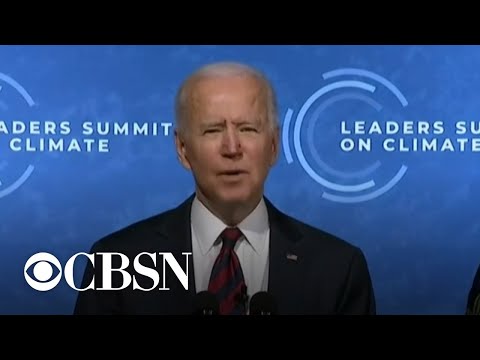 Biden pledges to cut emissions by at least half as he opens global climate summit.