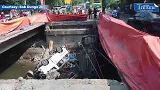 2 vehicles fall off Obispo Bridge in Tanza, Cavite