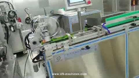 Automatic cosmetic cream bottle robot hand feed rotary filling capping machine