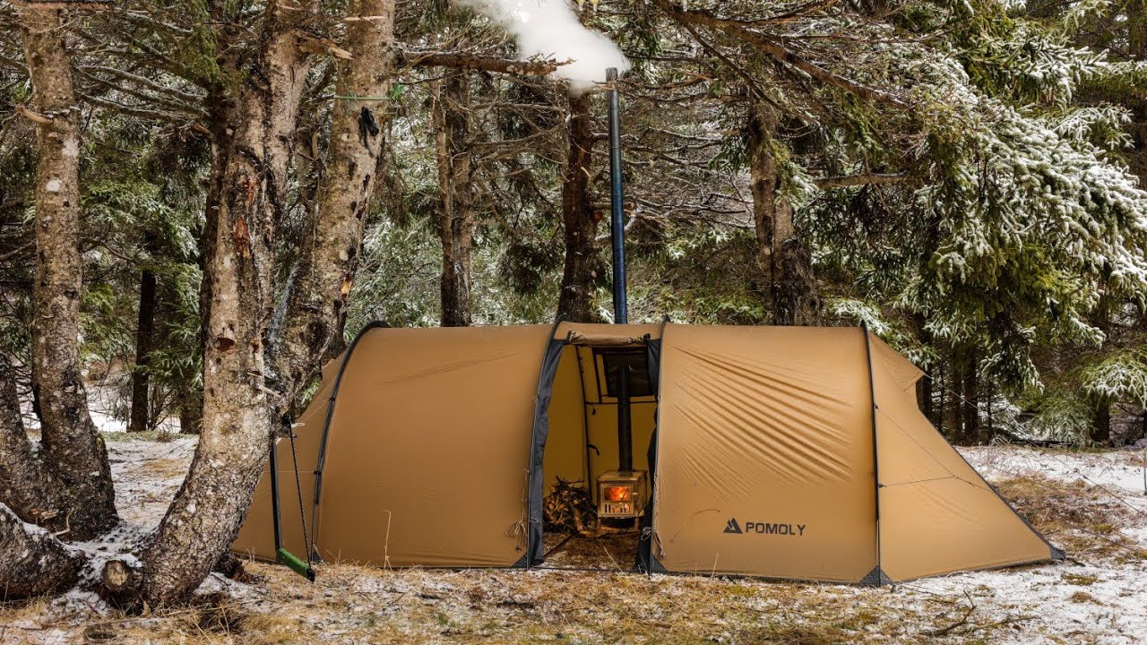 ⁣Winter HOT TENT CAMPING in the RAIN and Snow 