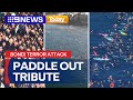 Massive crowds gather for paddle-out tribute to Bondi victims | 9 News Australia