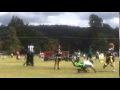 josh pulling flag in the flag football game this weekend; Elijah cheering in the background!