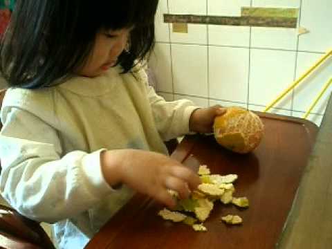 學剝橘子
