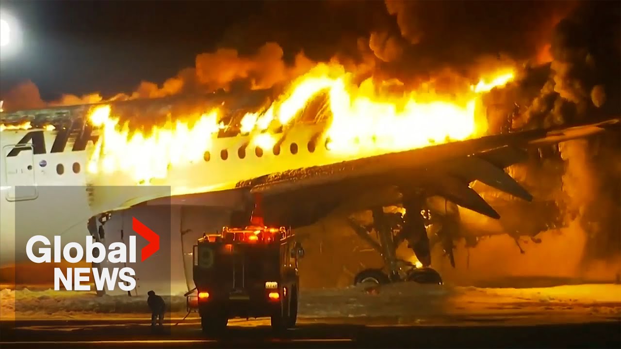 Japan Airlines plane bursts into flames in collision on runway