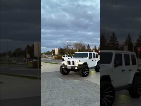 Jeep Wrangler White And Black In Colour 