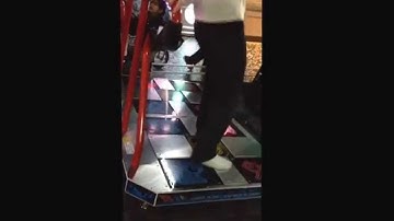 Guy at Dave and Busters dancing