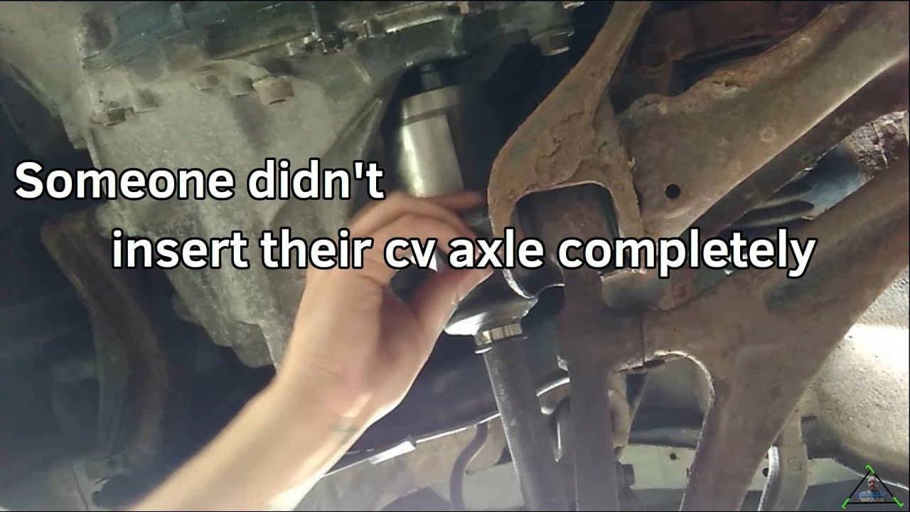 How to install a CV Axle with stuck ball joint bolt - YouTube