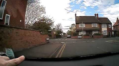 AshLing Driving How To Reverse around a sharp left corner - Bel Ayres lesson, view of